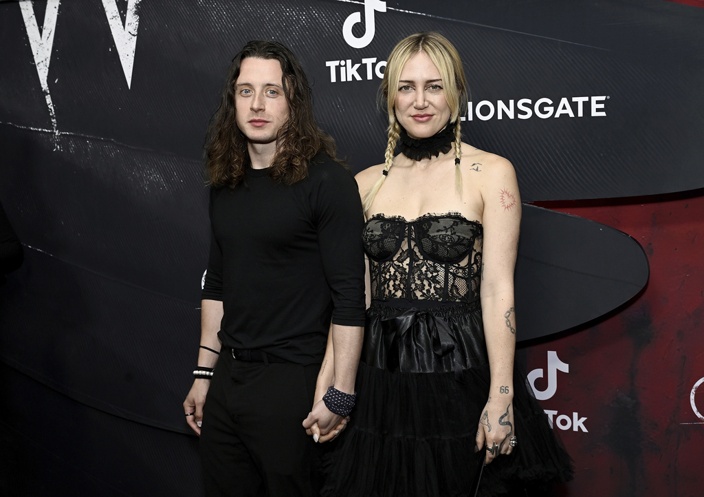 Rory Culkin, left, and wife Sarah Scrivener attend "The Crow" world premiere in New York City.