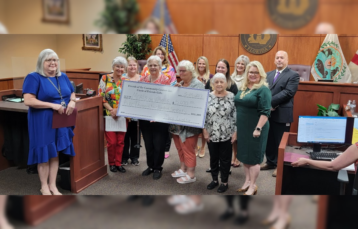 Front (L-R): Janice Hale, Senior Programs Supervisor; Kitty Porath, Friends Secretary; Irene Cocktrell, Circle of Friends Gift Shop Volunteer; Mary Laughlin, Friends President; Kathy Kovanda, Circle of Friends Gift Shop Volunteer; Linda Kelley, Circle of Friends Gift Shop Volunteer; Commissioner Ruthie Davis Schlabach. Back: (L-R) Commissioner Holly Davis; Commissioner Diana Finegan; Lynsie Roddenberry, Support Services Director; Commissioner Rebecca Bays; Commissioner Jeff Kinnard.