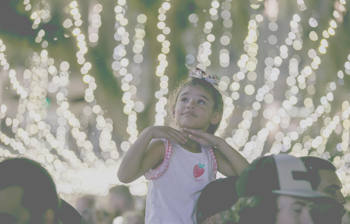 Nayah Moza marvels at the lights during the 39th annual Light Up Ocala event Downtown in Ocala on Saturday, Nov. 18, 2023. Thousands packed downtown to see the annual lighting of Christmas lights around the downtown square.