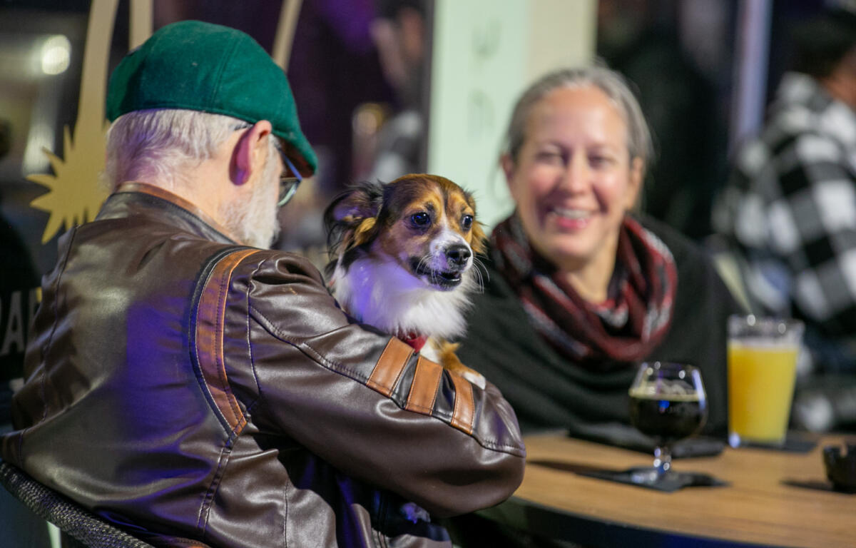 Brisbee has a drink with James and Meghan Pence during Ocala's First Friday Art Walk. Courtesy: Alan Youngblood/352today
