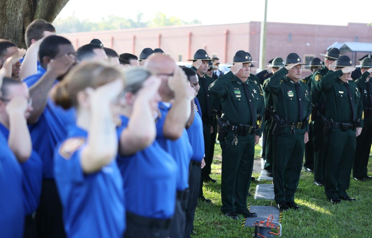 Those in attendance observed a moment of silence.