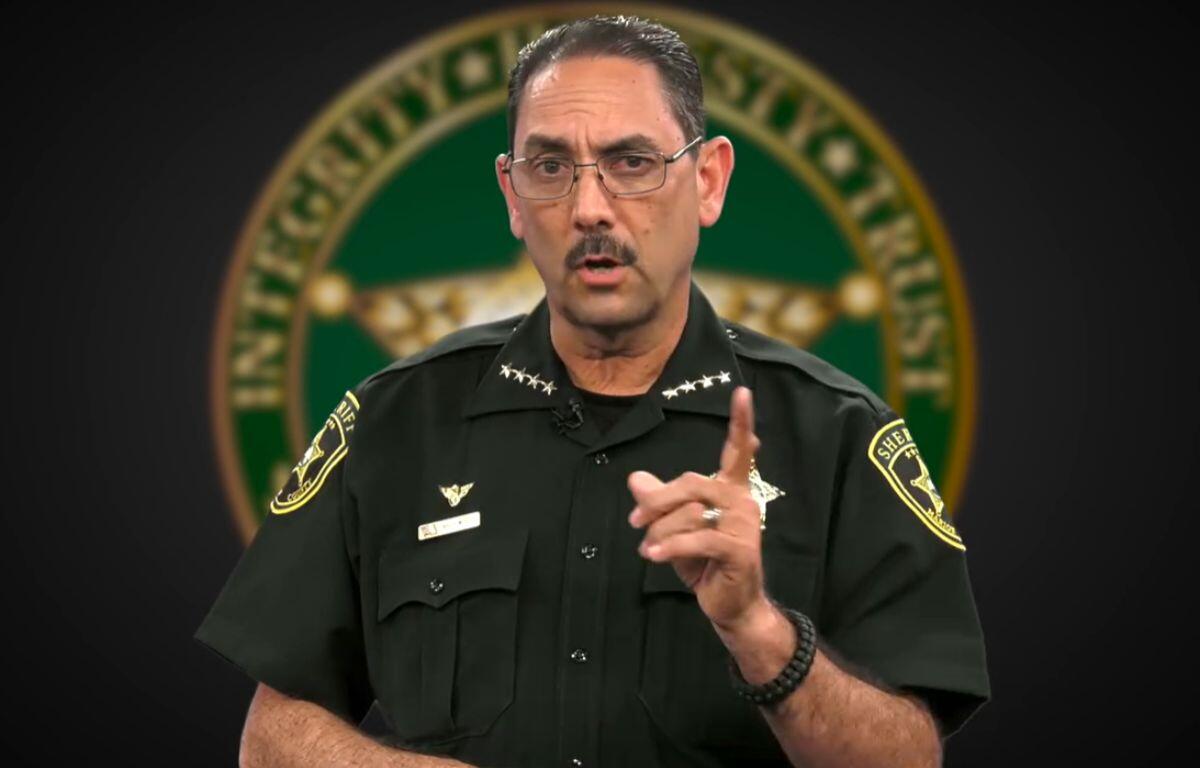 Sheriff Billy Woods speaks in uniform with the Marion County Sheriff's Office badge and emblem in the background.