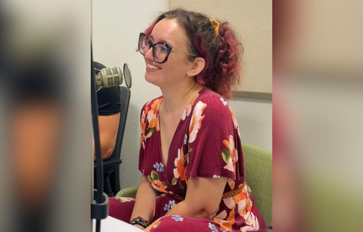 Ocala Clothing Swap founder Esmee Bancroft smiles while in the 93.7 K-Country studios being interviewed by host Kathy Dugan.