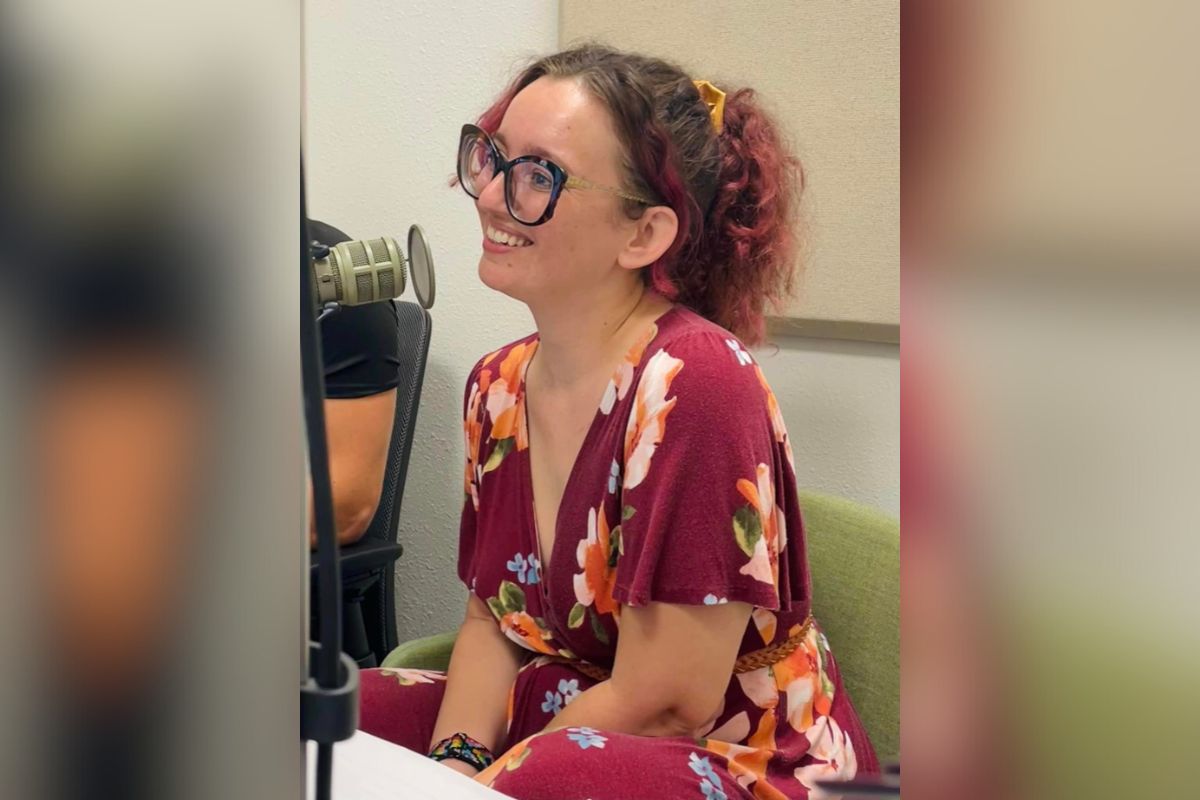 Ocala Clothing Swap founder Esmee Bancroft smiles while in the 93.7 K-Country studios being interviewed by host Kathy Dugan.