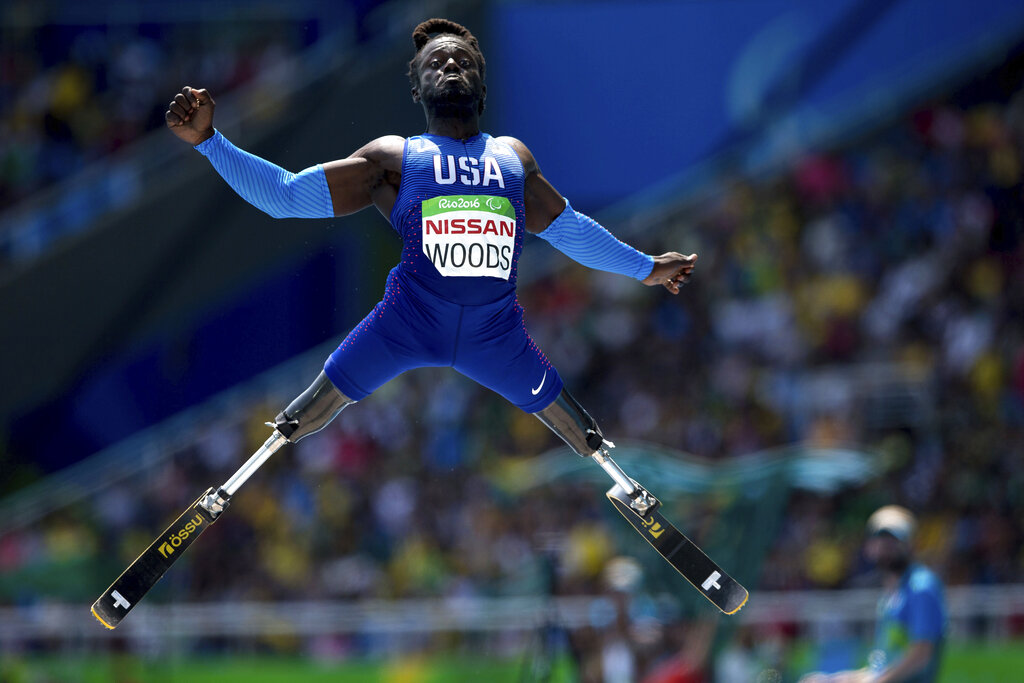 In this Sept. 17, 2016, file photo, Regas Woods, of the United States, flies through the air as competes in the men's long jump