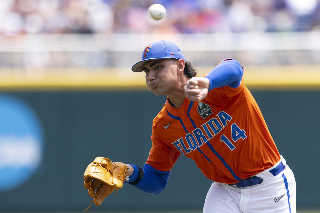 Florida starting pitcher Jac Caglianone throws during the first inning of a baseball game against TCU at the NCAA College World Series in Omaha, NE.