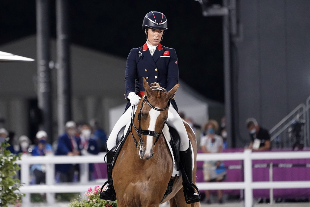 Charlotte Dujardin, riding Gio, competes in the equestrian dressage individual final at the 2020 Summer Olympics, Wednesday, July 28, 2021, in Tokyo.