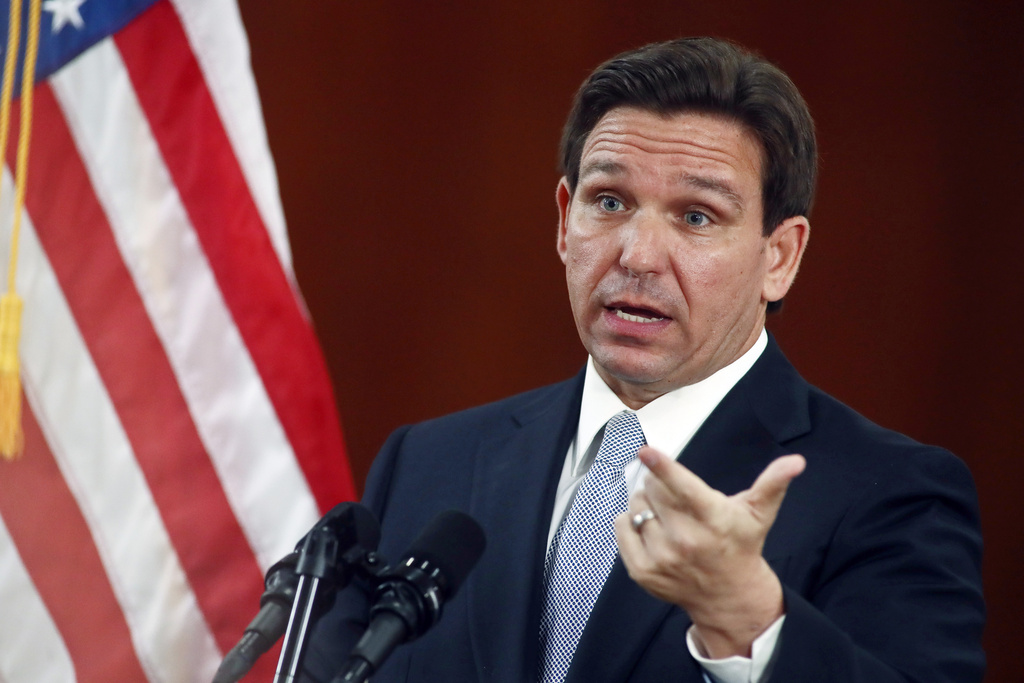 Florida Gov. Ron DeSantis answers questions from the media, March 7, 2023, at the state Capitol in Tallahassee, FL.