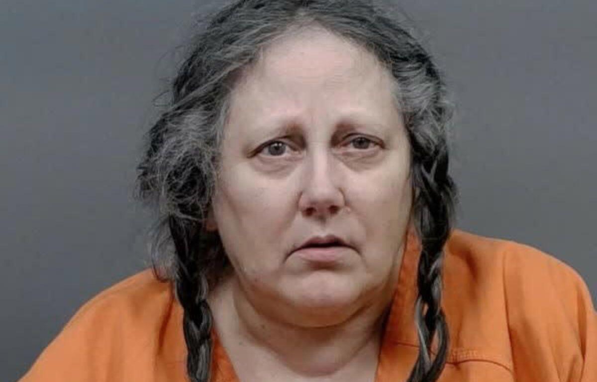 Image is the booking photo of 61-year-old Tracy Lee Stanley who is charged with second-degree murder in the death of 72-year-old Andrea Kathleen Day.