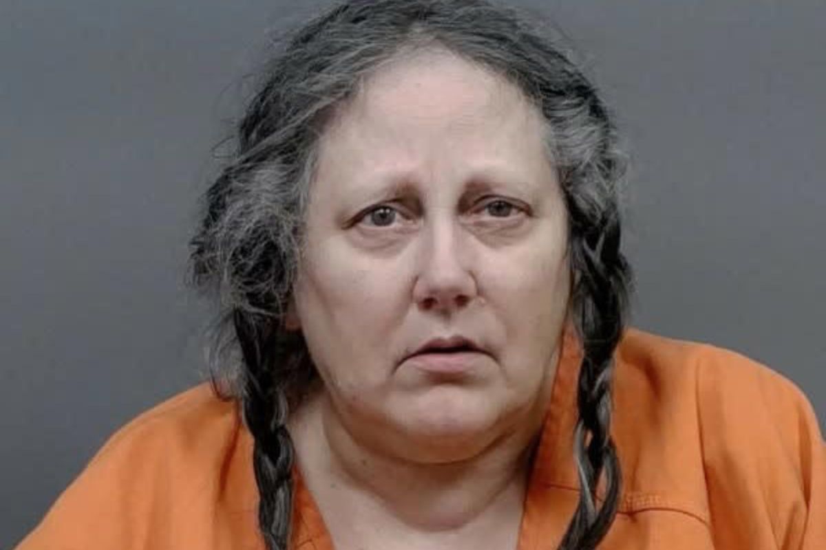 Image is the booking photo of 61-year-old Tracy Lee Stanley who is charged with second-degree murder in the death of 72-year-old Andrea Kathleen Day.
