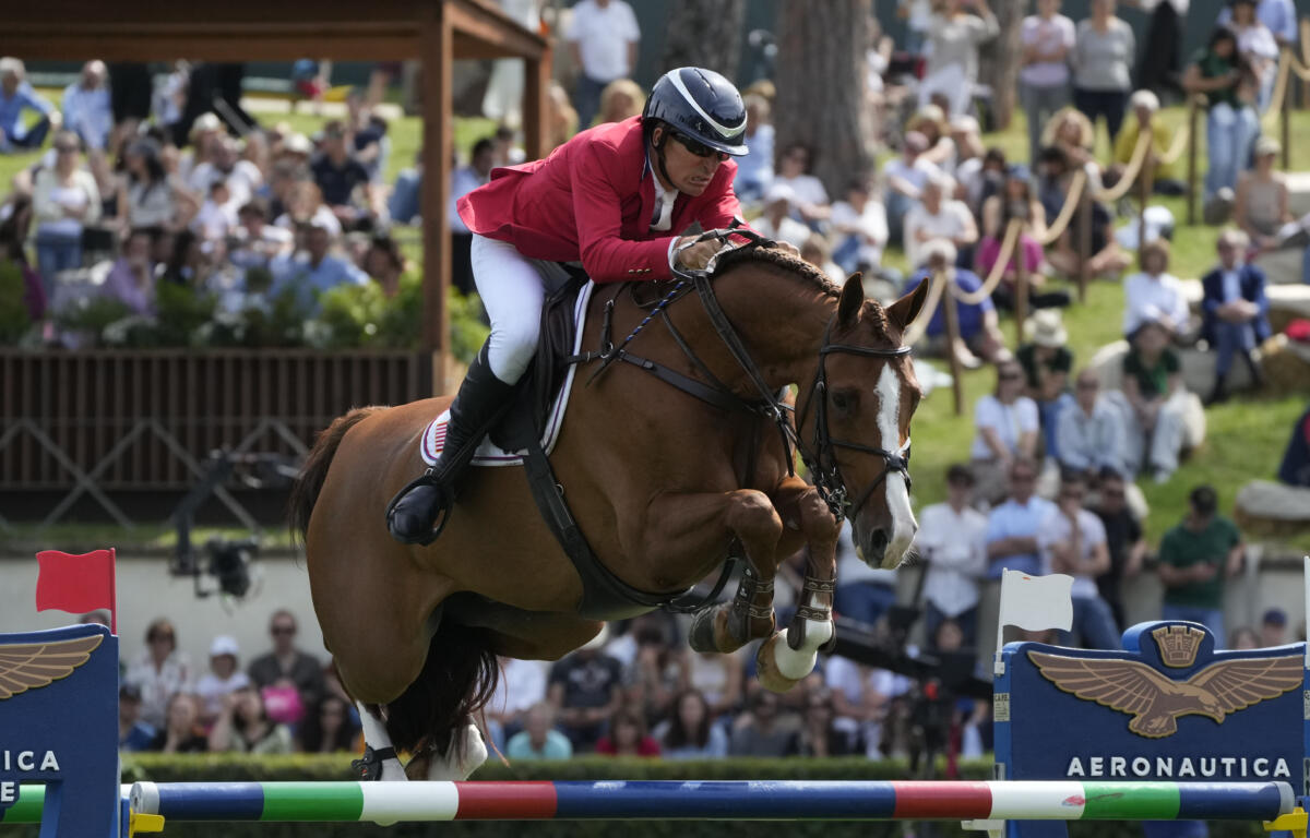 United States' Aaron Vale on Carissimo 25 competes during the Nation Cup at the Grand Prix competition at Rome's Piazza di Siena International Horse Show, Friday, May 24, 2024. Courtesy: AP Photo/Gregorio Borgia