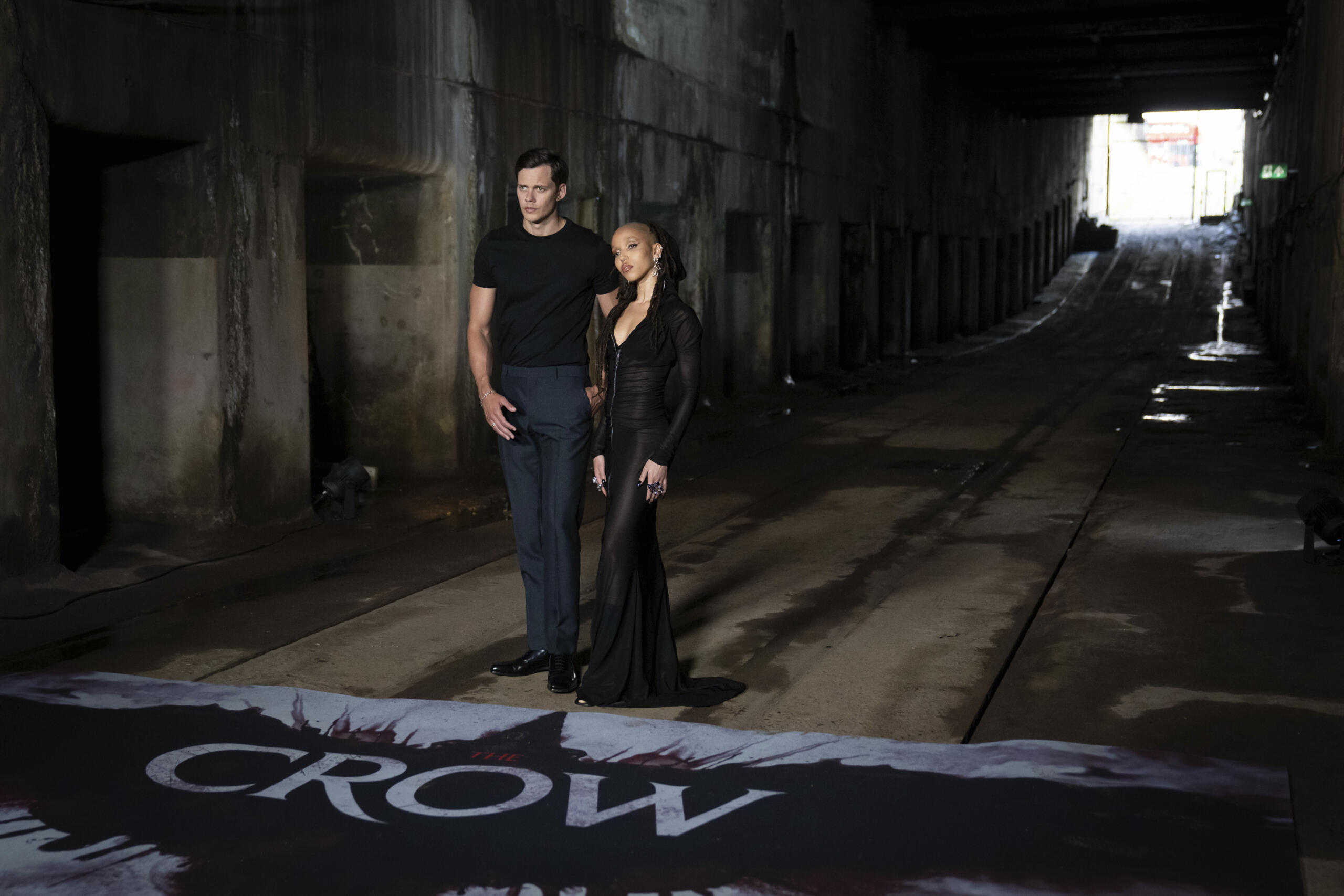 Bill Skarsgard, left, and FKA Twigs pose for photographers upon arrival at the photo call for the film 'The Crow' in London.