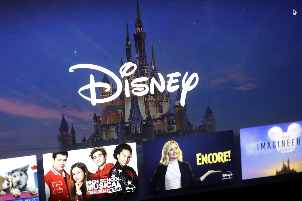 A Disney logo forms part of a Disney Plus menu on a computer screen