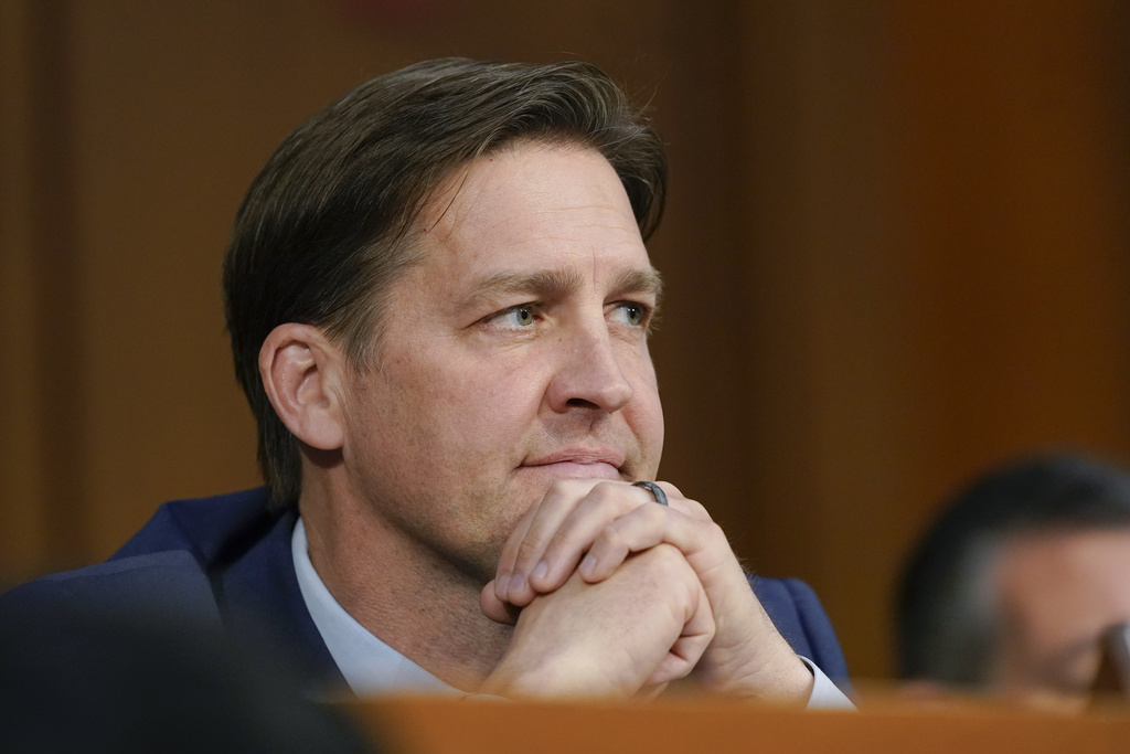 Image of former UF President Ben Sasse sitting with his hands clasped.