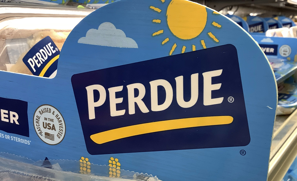 Perdue products sit in a poultry section of a supermarket.