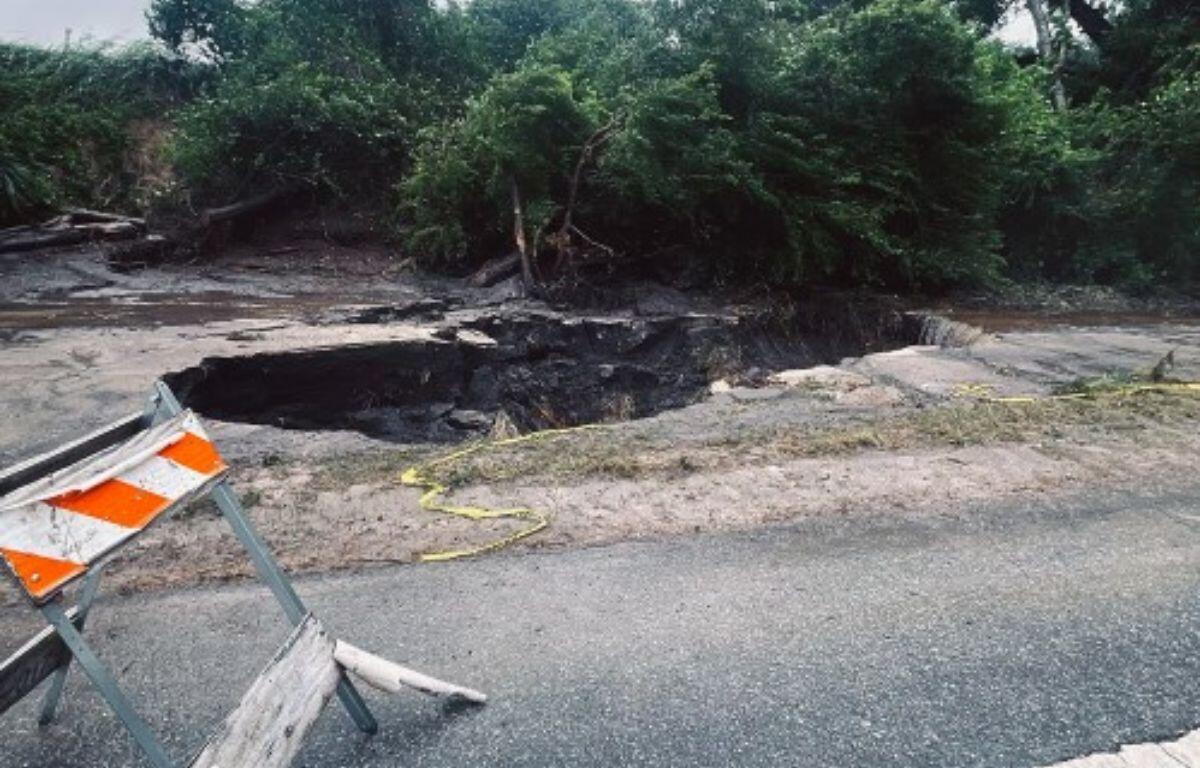 Image shows a sinkhole on West Newberry Road