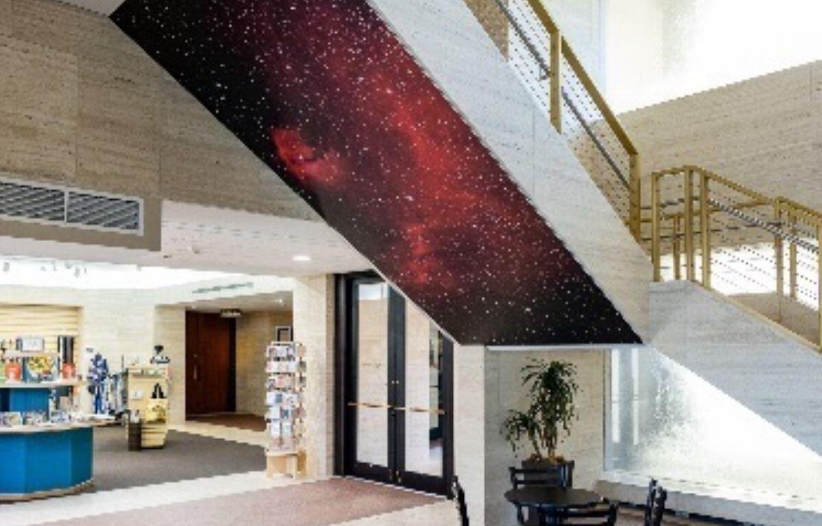 Image shows art installation based on a composite photograph of the cosmos.