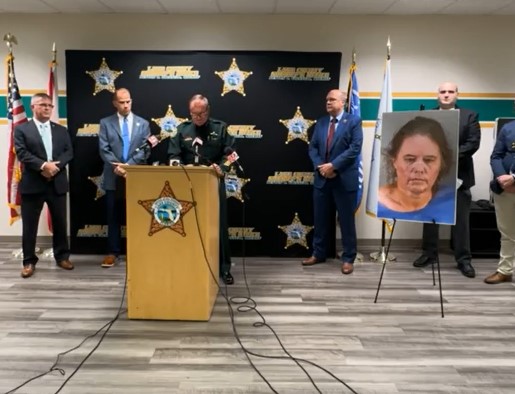 Image of Sheriff Peyton Grinnell at a podium holding a news conference at the Lake County Sheriff's Office in Tavares.