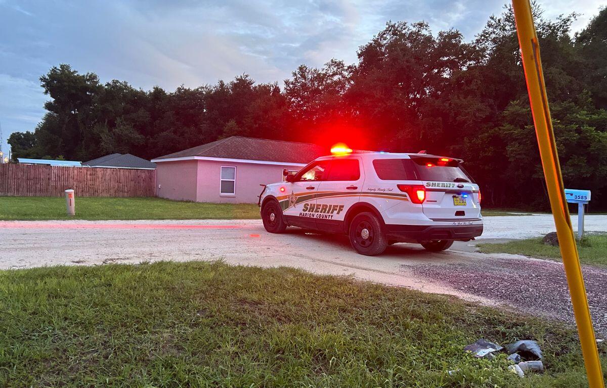 Image of a Marion County Sheriff's Office patrol vehicle with emergency lights on.