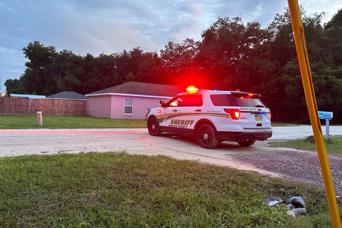 Image of a Marion County Sheriff's Office patrol vehicle with emergency lights on.