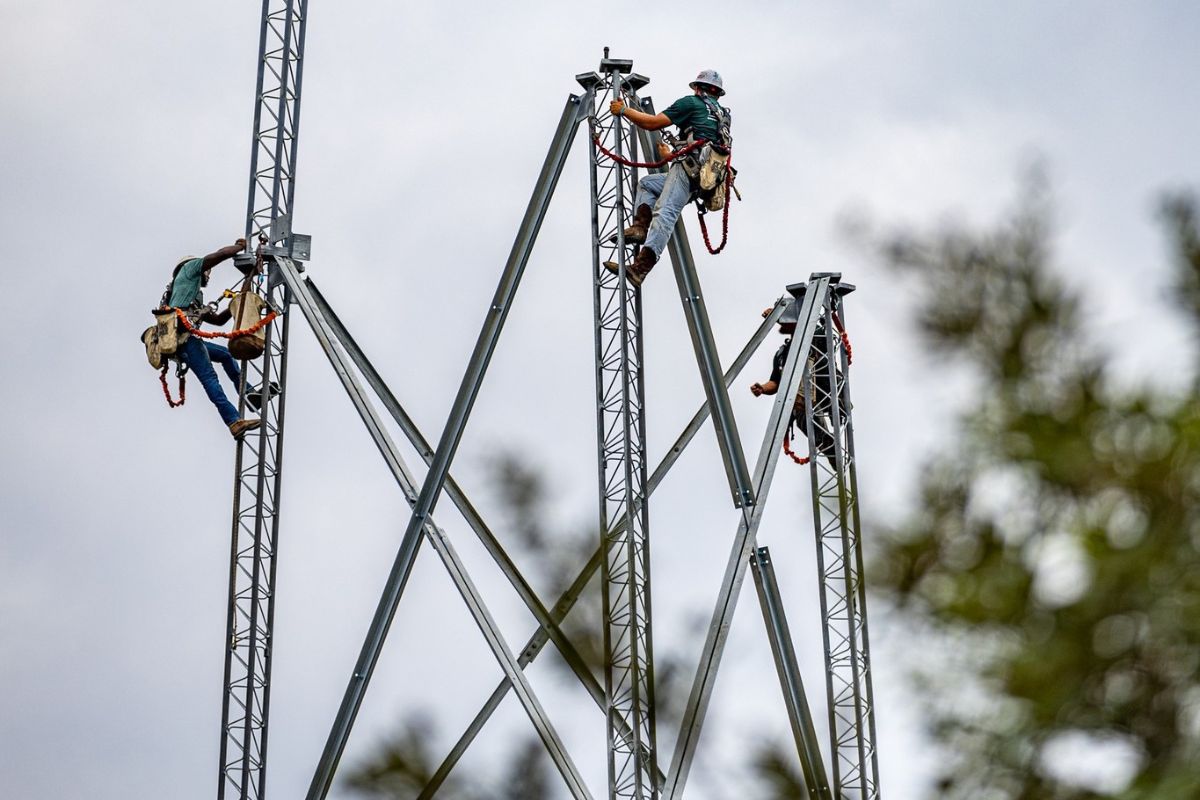 Photo shows new radio towers being constructed.
