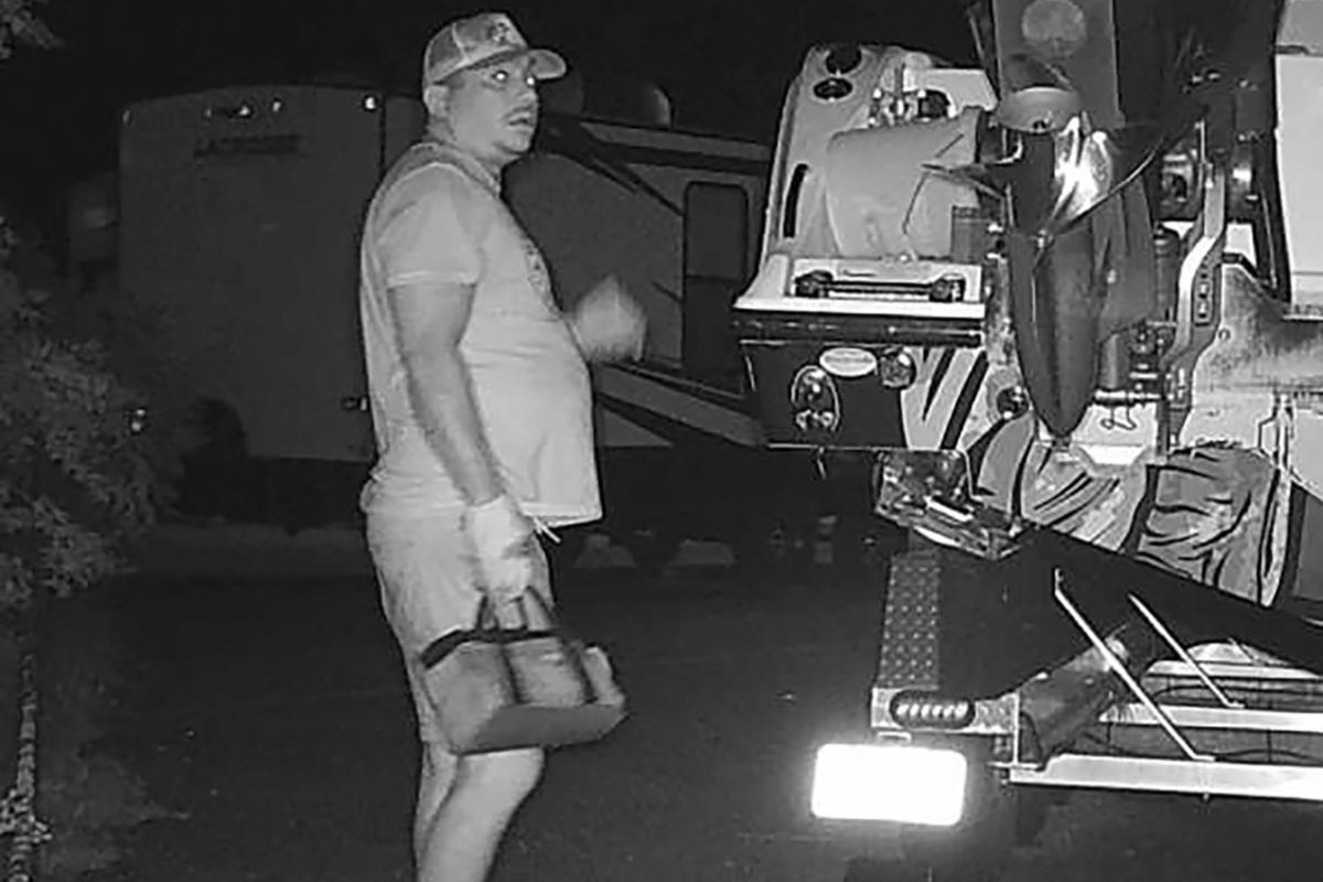 Photo shows man as he is captured on camera breaking into a boat and RV storage facility.
