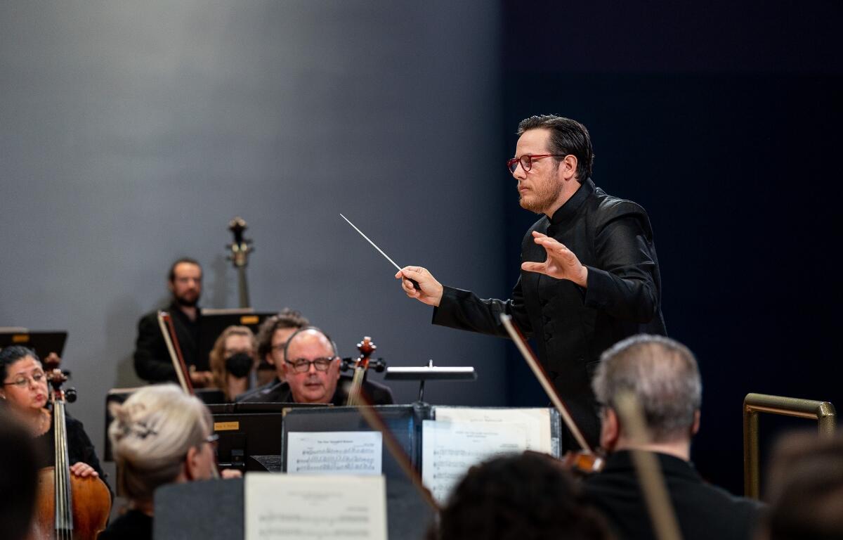 The Ocala Symphony Orchestra will perform at Symphony Under the Lights on December 6, 2024, at Tuscawilla Park, celebrating 21 years of holiday music under the stars.