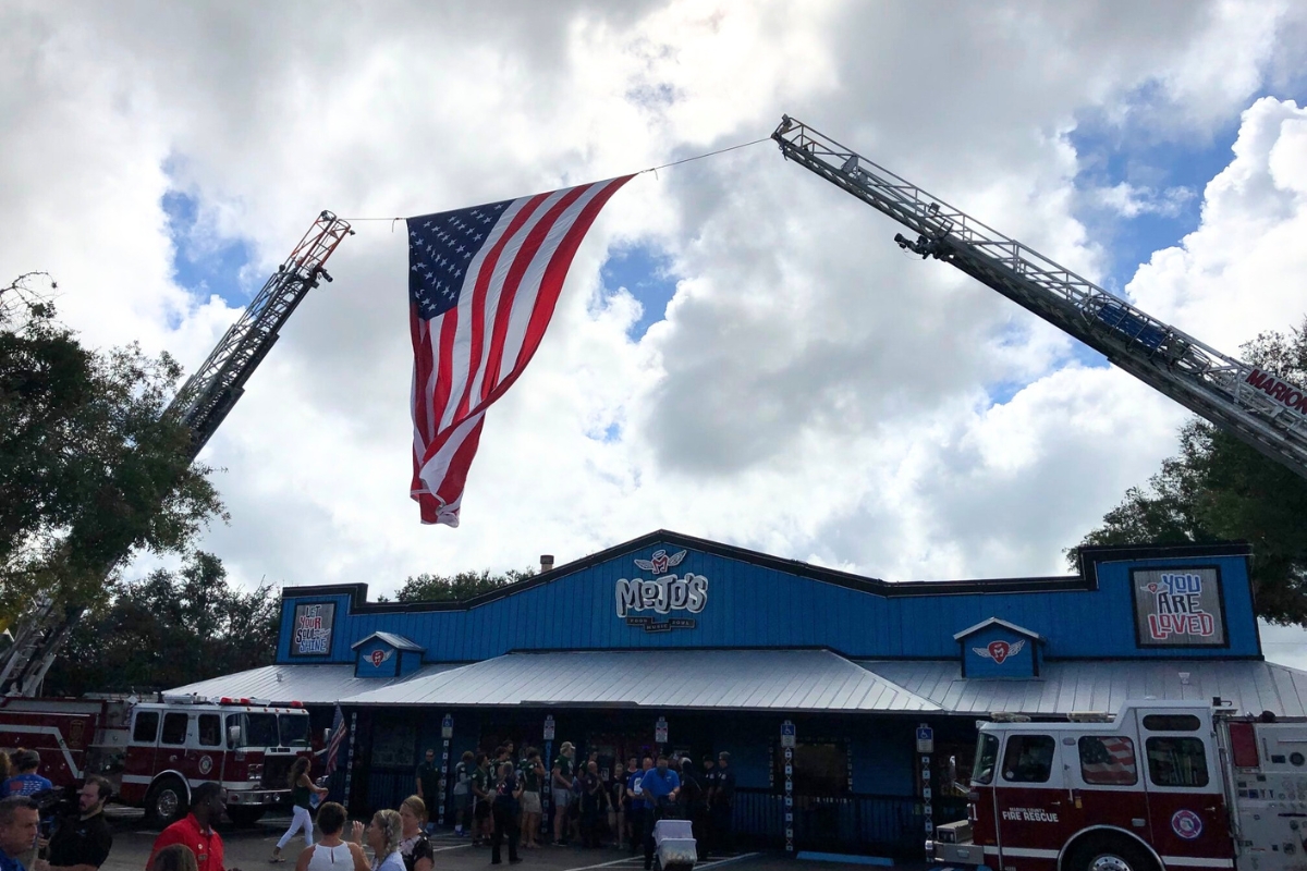 American flag flying over Mojo Grill & Catering, Ocala, FL