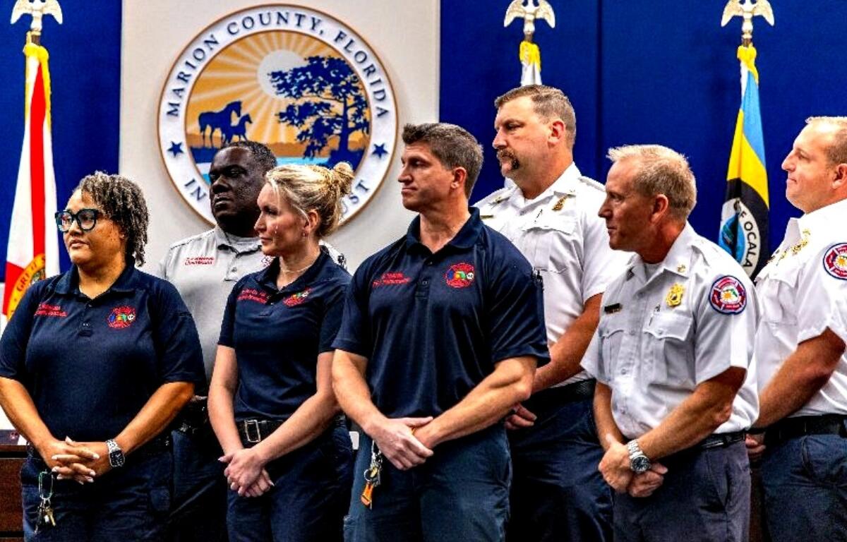 Members of Marion County Fire Rescue joined county commissioners on stage to receive a proclamation honoring the community paramedicine program.
