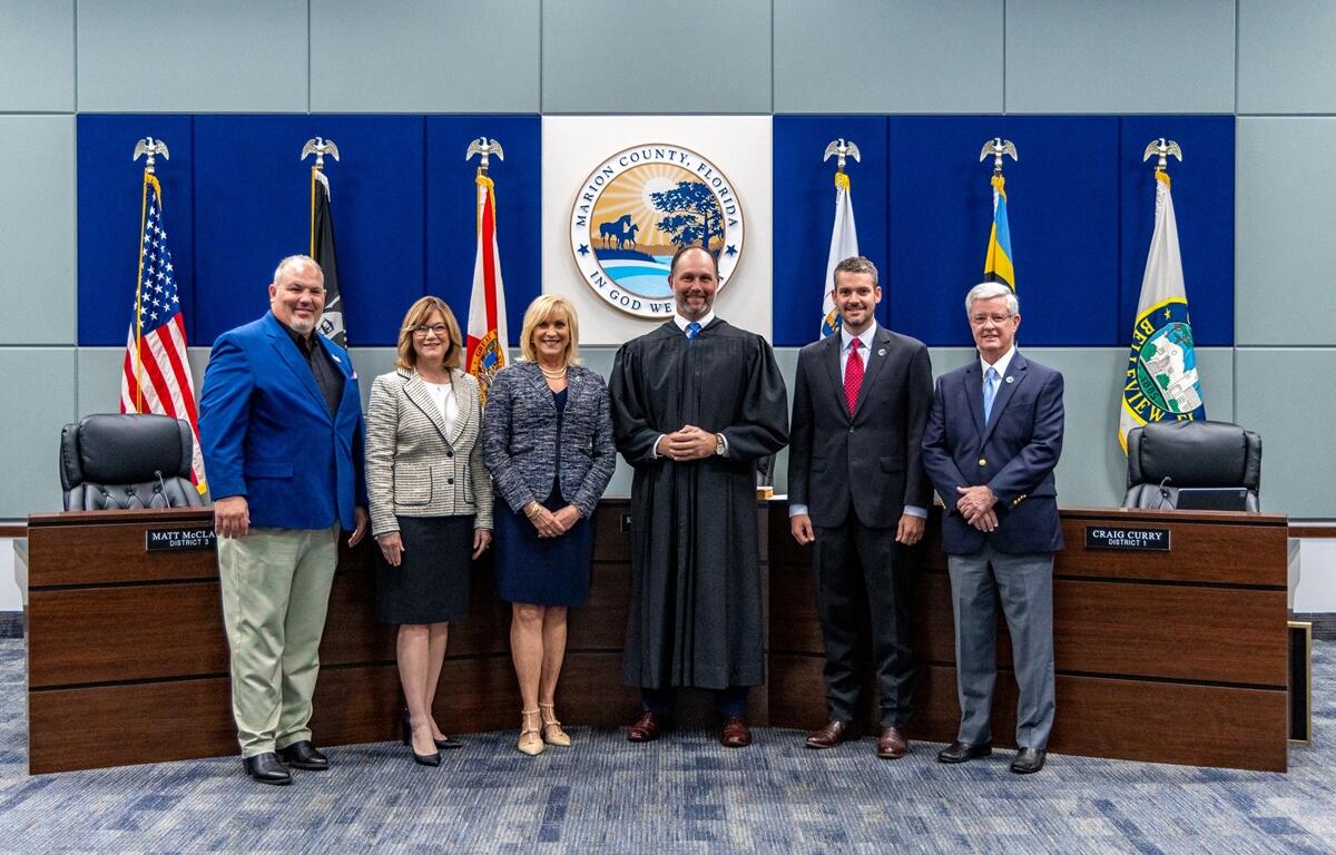 From left to right: Marion County Commissioners Carl Zalak, Kathy Bryant, Michelle Stone, Judge Tim McCourt, and Commissioners Matt McClain and Craig Curry. Courtesy: Marion County, FL
