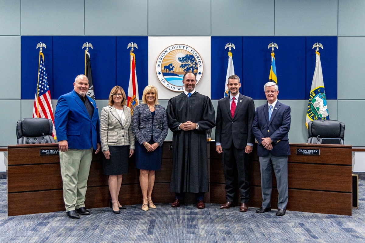 From left to right: Marion County Commissioners Carl Zalak, Kathy Bryant, Michelle Stone, Judge Tim McCourt, and Commissioners Matt McClain and Craig Curry. Courtesy: Marion County, FL