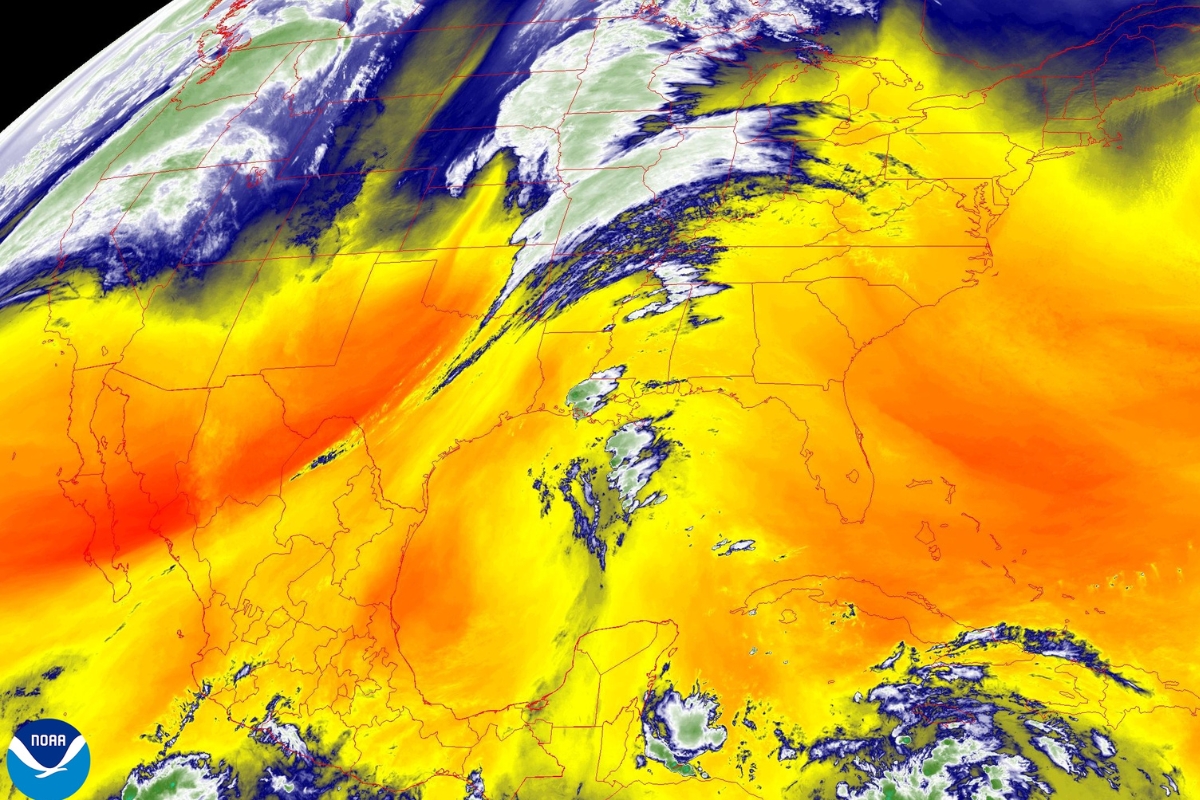 The map shows current weather conditions in the Caribbean and Florida, currently no threat from Invest 99-L.