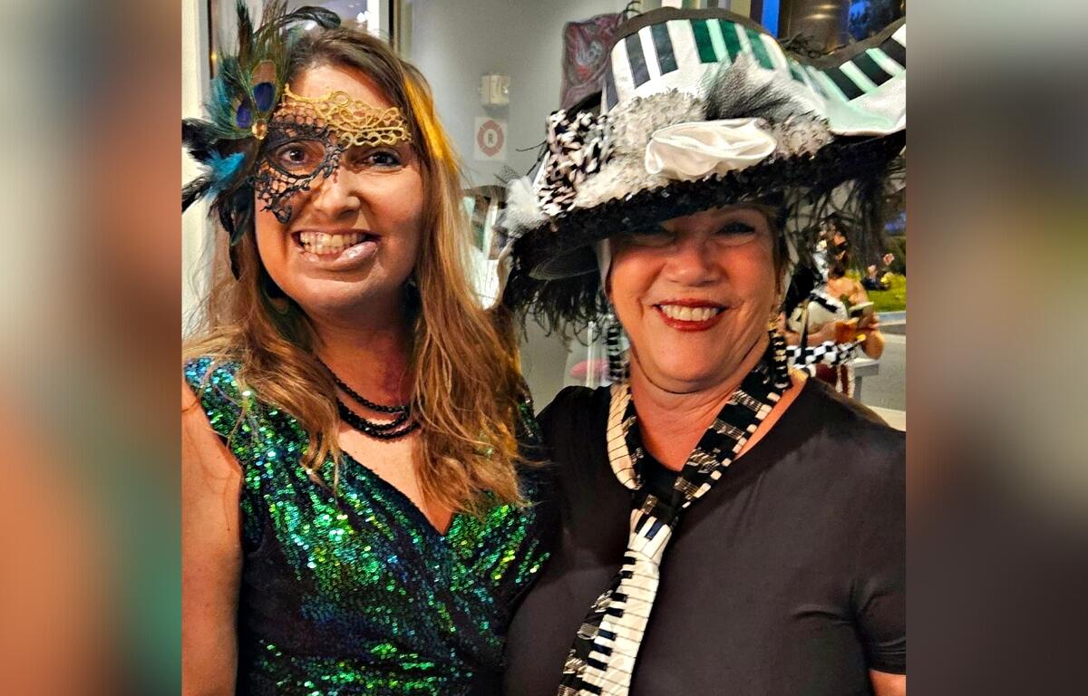 Tammy Warren from Ocala Electric Utilities and friend at MCA Surrealist Ball