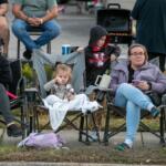 Parade fans wait for the start before the annual Ocala Christmas Parade.