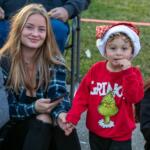 Bryson Caldwell, 3, and mom Joselyn Martin wait for the parade.