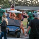 Nothing says Christmas like T-Rex and Triceratops. leading the annual Ocala Christmas Parade.