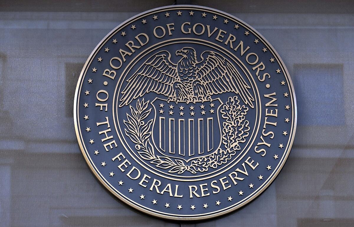 The seal of the Federal Reserve Board is seen at the building in Washington, Dec. 8, 2024.