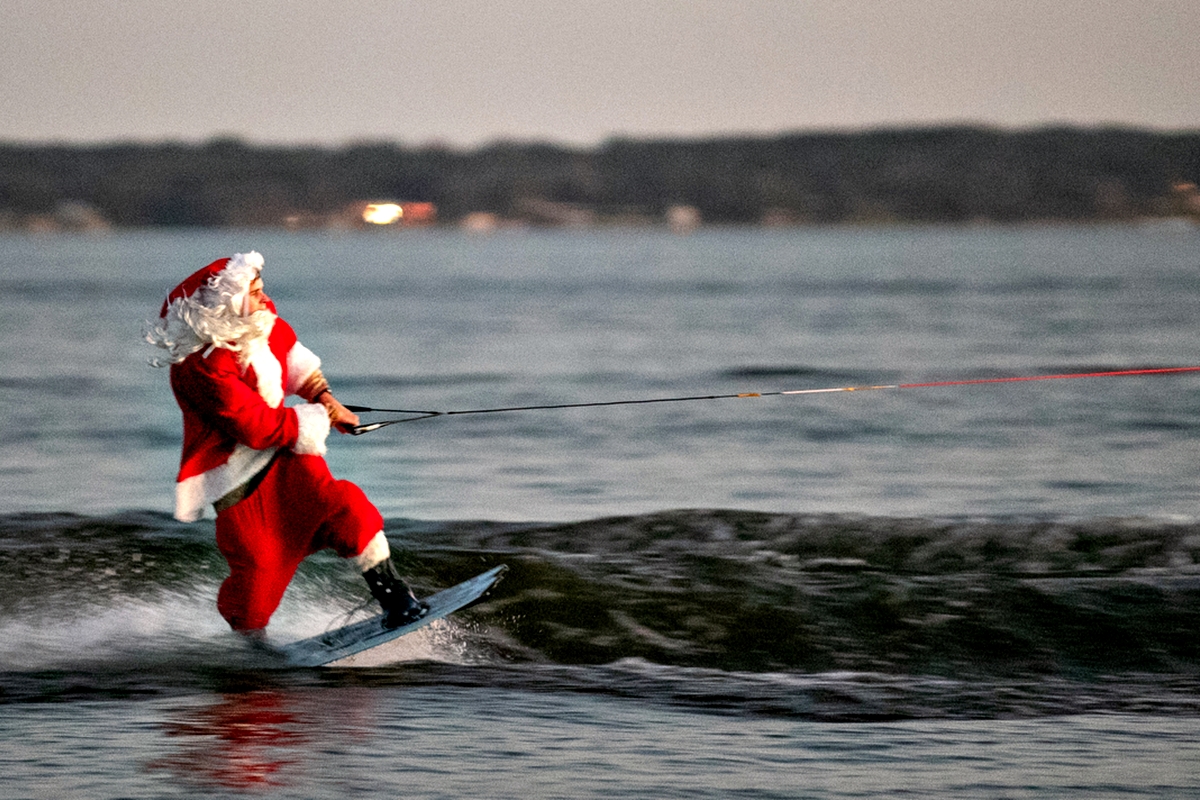 Water ski Santa delights crowds during annual Lake Weir holiday boat parade. Courtesy: Alan Youngblood/352today