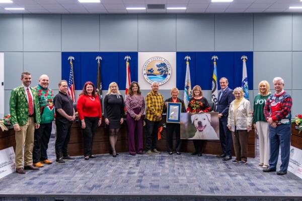 Lilly Baron of the SPCA of Ocala honors Molly's legacy during the Marion County Animal Abuser Registry Awareness Month announcement.