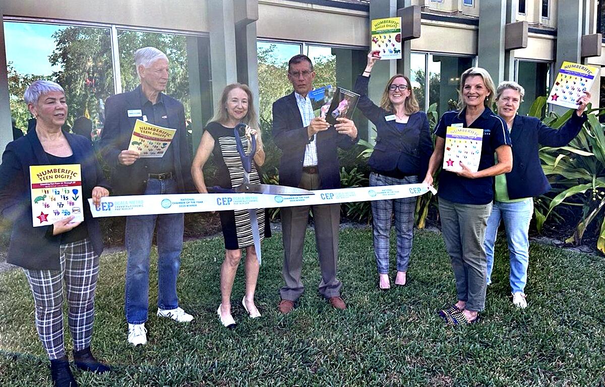 A ribbon-cutting ceremony for Noelle Vander Brink's educational book series, designed to help children learn to count, was held at the Ocala Metro CEP on Dec. 9.