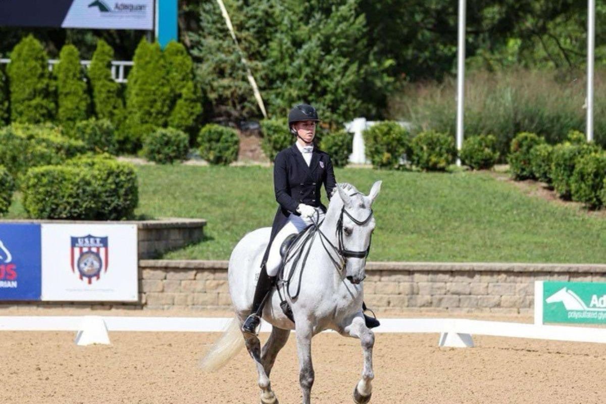 Ocala-based rider Sophia Schults, 2018 National Equitation Champion, rides Conocido HGF during a 2024 dressage competition.