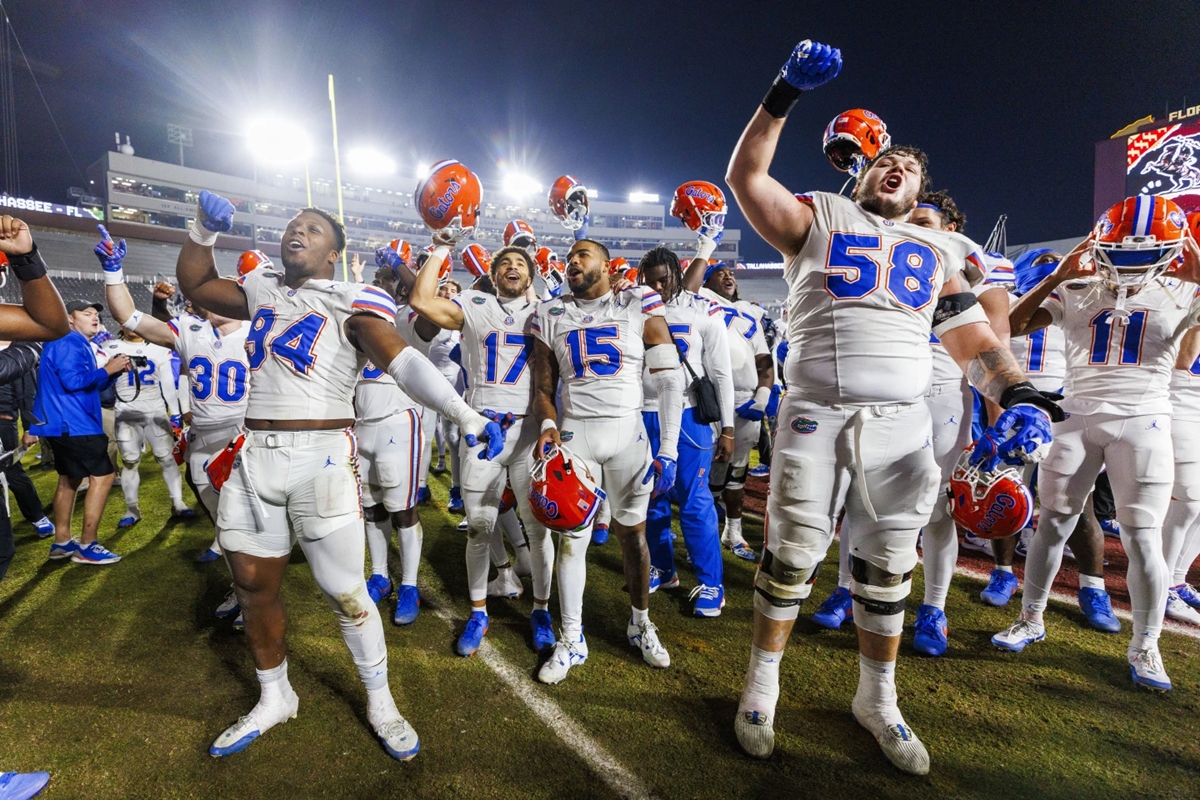 Florida players celebrate after defeating Florida State 31-11 after a NCAA college football game Saturday, Nov. 30, 2024, in Tallahassee.