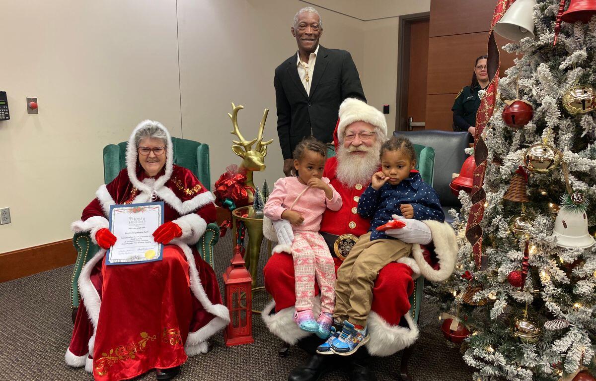 Children were presented with their adoption certificates by Santa and Mrs. Claus during an adoption event at the Marion County Courthouse. on Friday, Dec. 13, 2024.