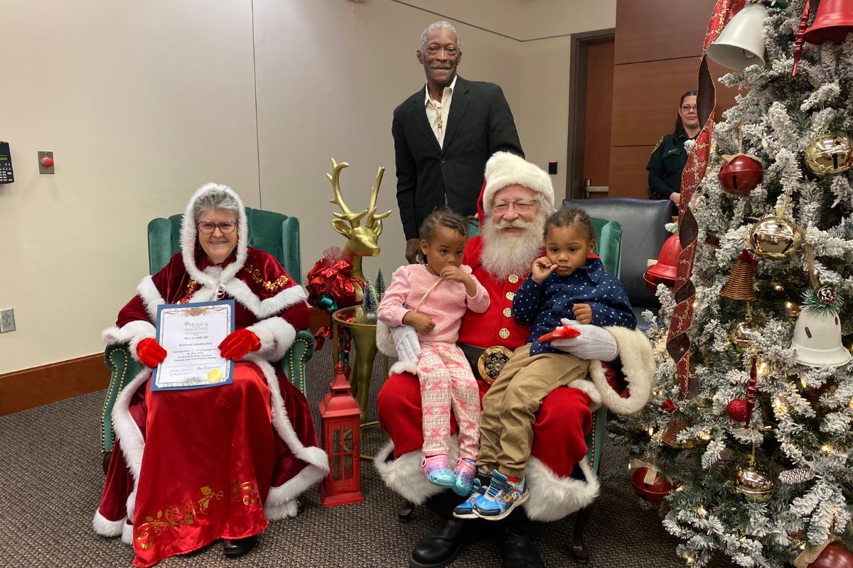 Children were presented with their adoption certificates by Santa and Mrs. Claus during an adoption event at the Marion County Courthouse. on Friday, Dec. 13, 2024.