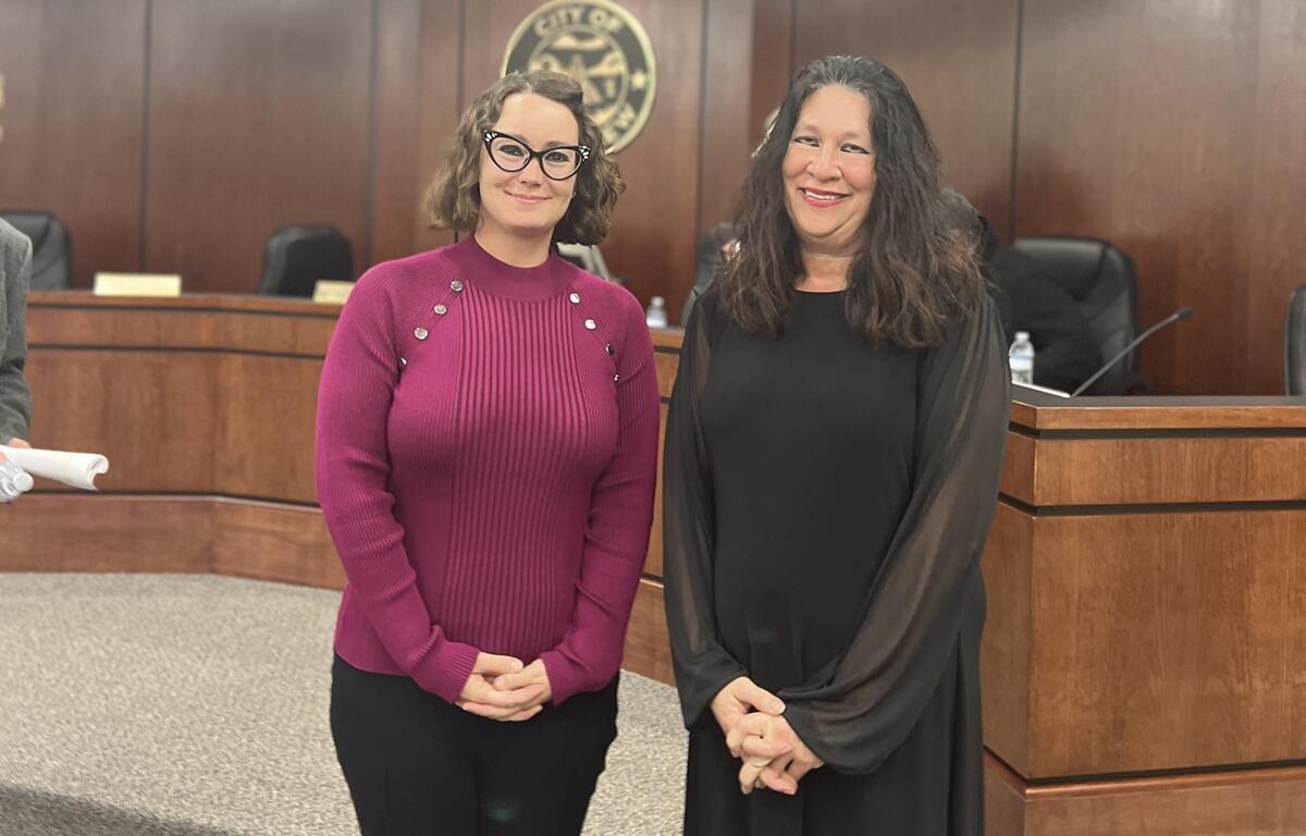Lezli Merritt, newly appointed Belleview City Clerk, stands with Mayor Christine Dobkowski following Merritt's official swearing-in ceremony at City Hall.
