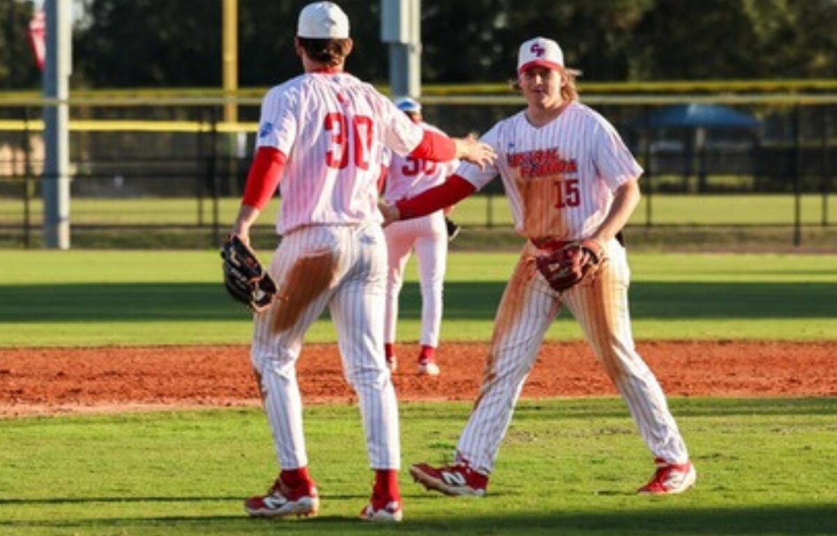 CF Patriots celebrate their 9-4 victory over A3 Academy, fueled by strong relief pitching and key hits from Victor Martinez Jr. and Jacob McKenzie.