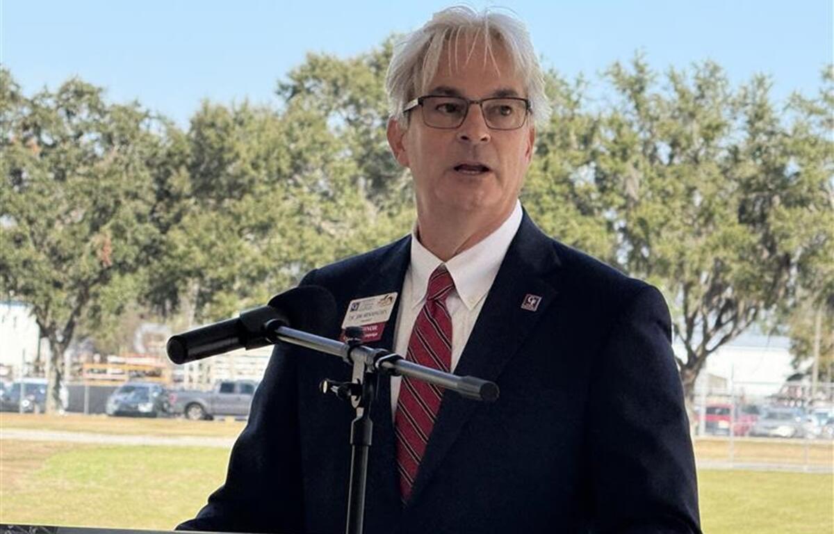 College of Central Florida President Jim Henningson speaks to attendees at the grand opening of the AdventHealth Center for Nursing, highlighting the facility’s impact on healthcare education and workforce development.
