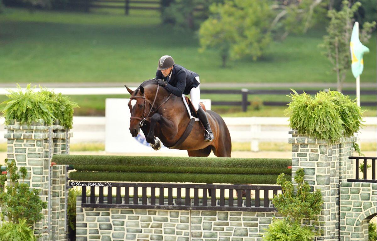 Josh Dolan of Ocala rides Something Blue during a competition. The pair have become a dominant force in the show hunter world.