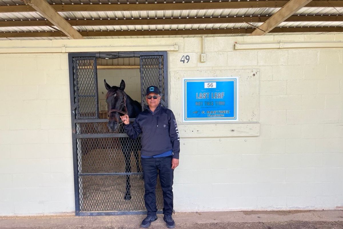 Gilberto Martinez stands with Last Leaf at Barn 12 at the OBS Sales Pavilion on Jan. 28, 2025. The 6-year-old mare was the sales topper, bringing $140,000.