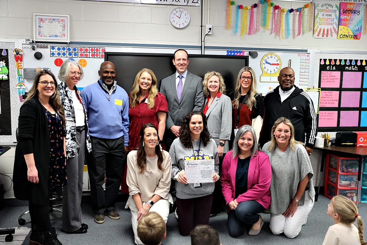 Kristi Gibbs, a second-grade teacher at Madison Street Academy, is recognized with the "Thank a Teacher" award by HCA Florida Healthcare and the Public Education Foundation of Marion County during a school event on Jan. 27.